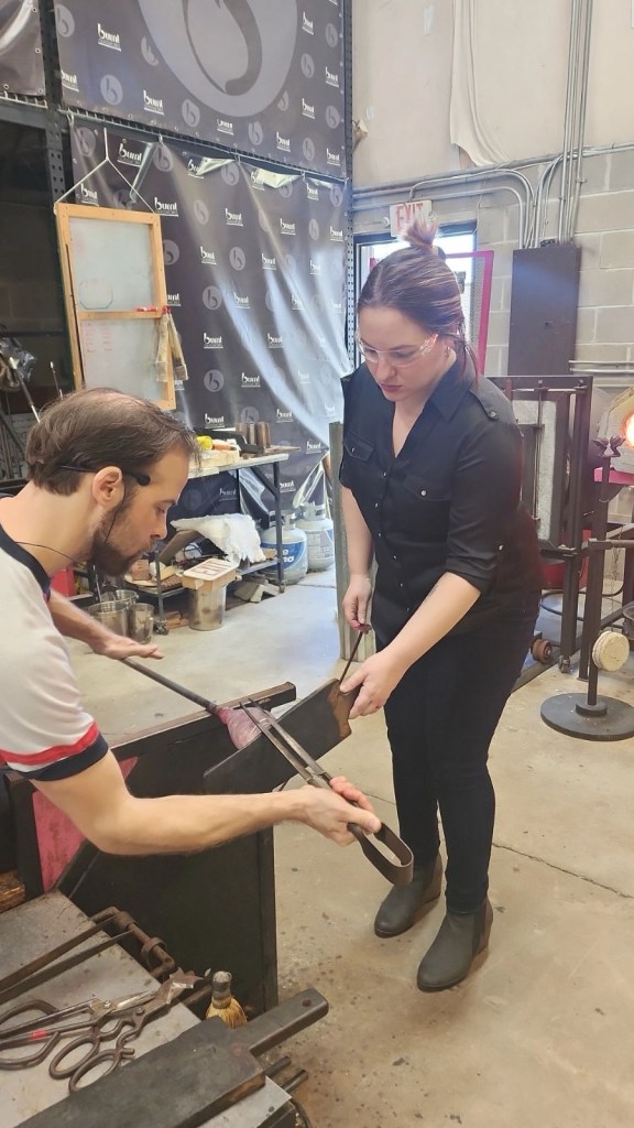 blowing glass at burnt glassworks